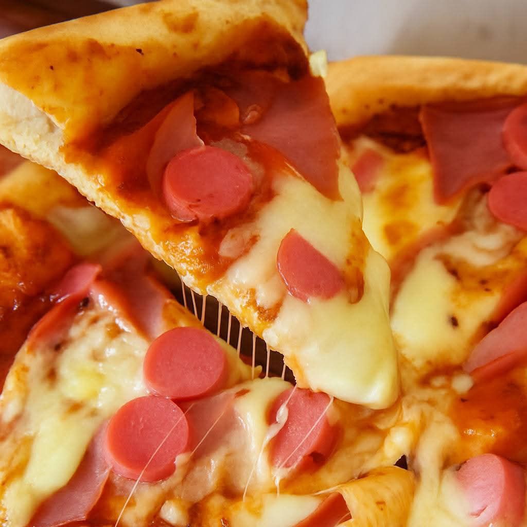 Pizza 8 rebanadas carnes Frías