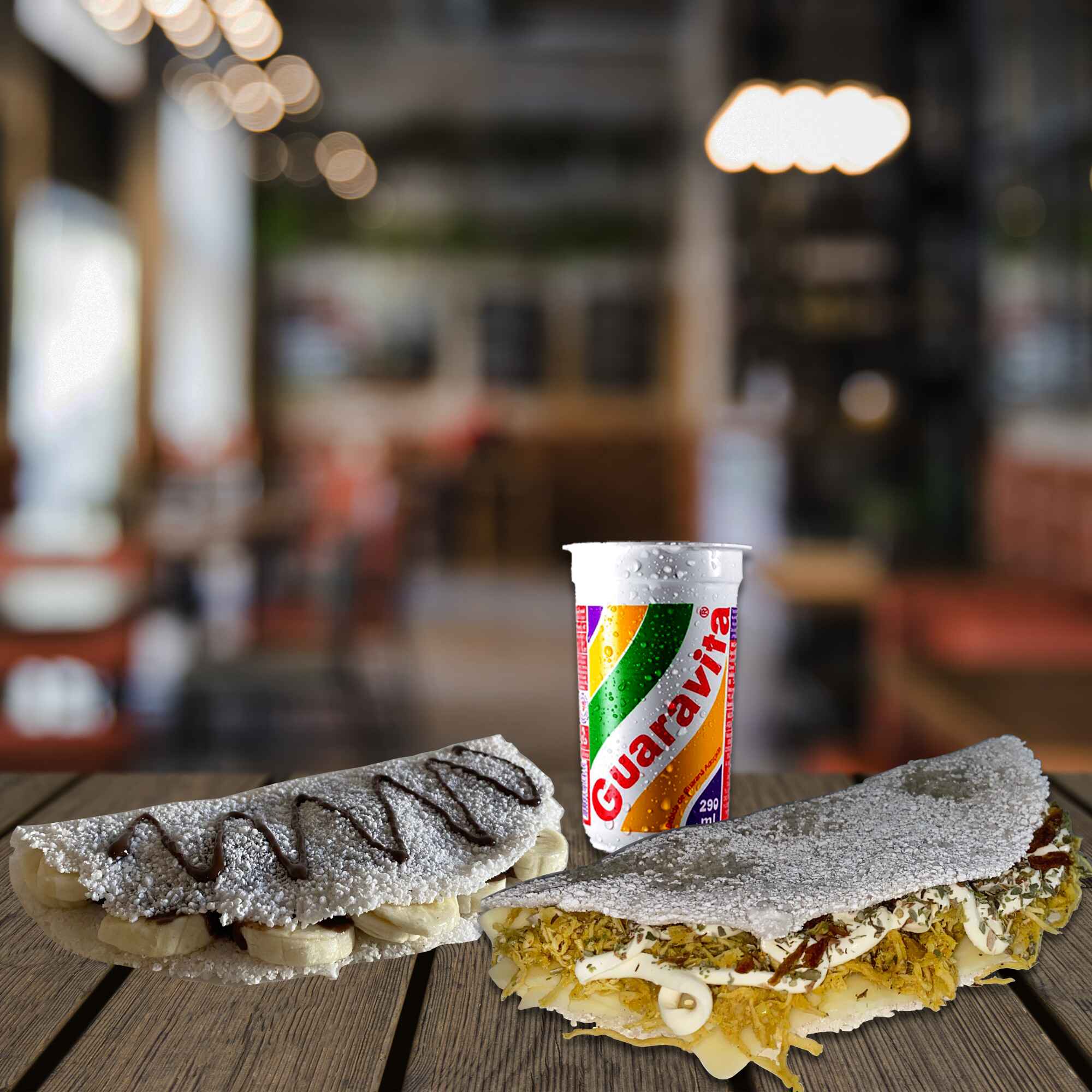 Comece com uma tapioca caprichada de frango desfiado com queijo derretendo, finalizada com manteiga na chapa e um toque de orégano que dá aquele sabor especial. E pra adoçar, uma clássica: banana com Nutella, cremosa e deliciosa. Um combo que vai do salgado ao doce sem erro!