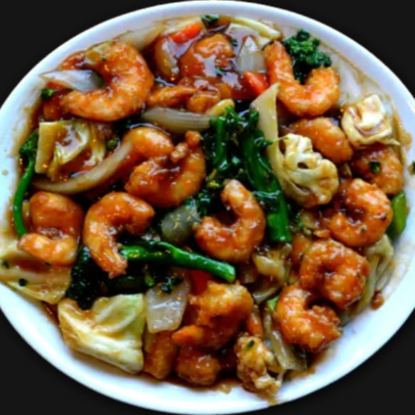 file de peixe panga, com camarão, acelga, repolho, couve- flor, brócolis, cenoura, cebola, pimentão, temperado com molho shoyo.