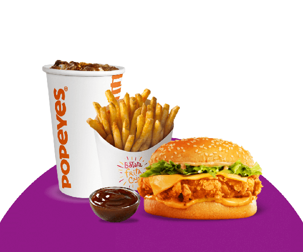 Desfrute Popeyes com essa oferta de quatro itens em um só produto: Sanduíche Clássico + Fritas Cajun + Molho + Bebida à sua escolha.