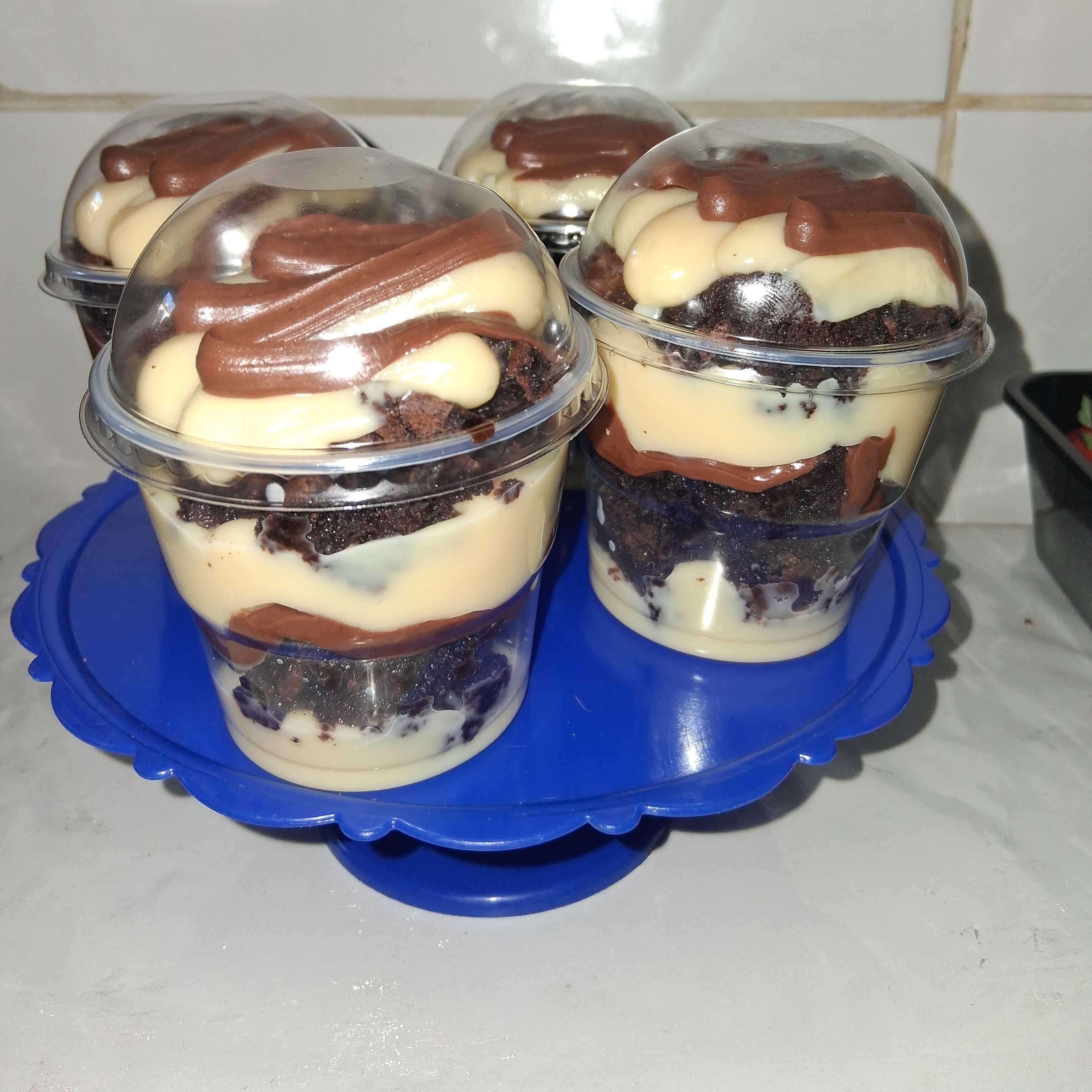 Uma explosão de sabor em cada colherada! nosso copo de 150ml combina pedaços macios de brownie com o brigadeiro cremoso de leite ninho e uma generosa camada de creme de avelã.