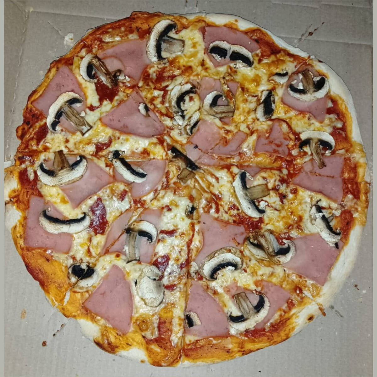 Pizza de Jamon y Champiñon
