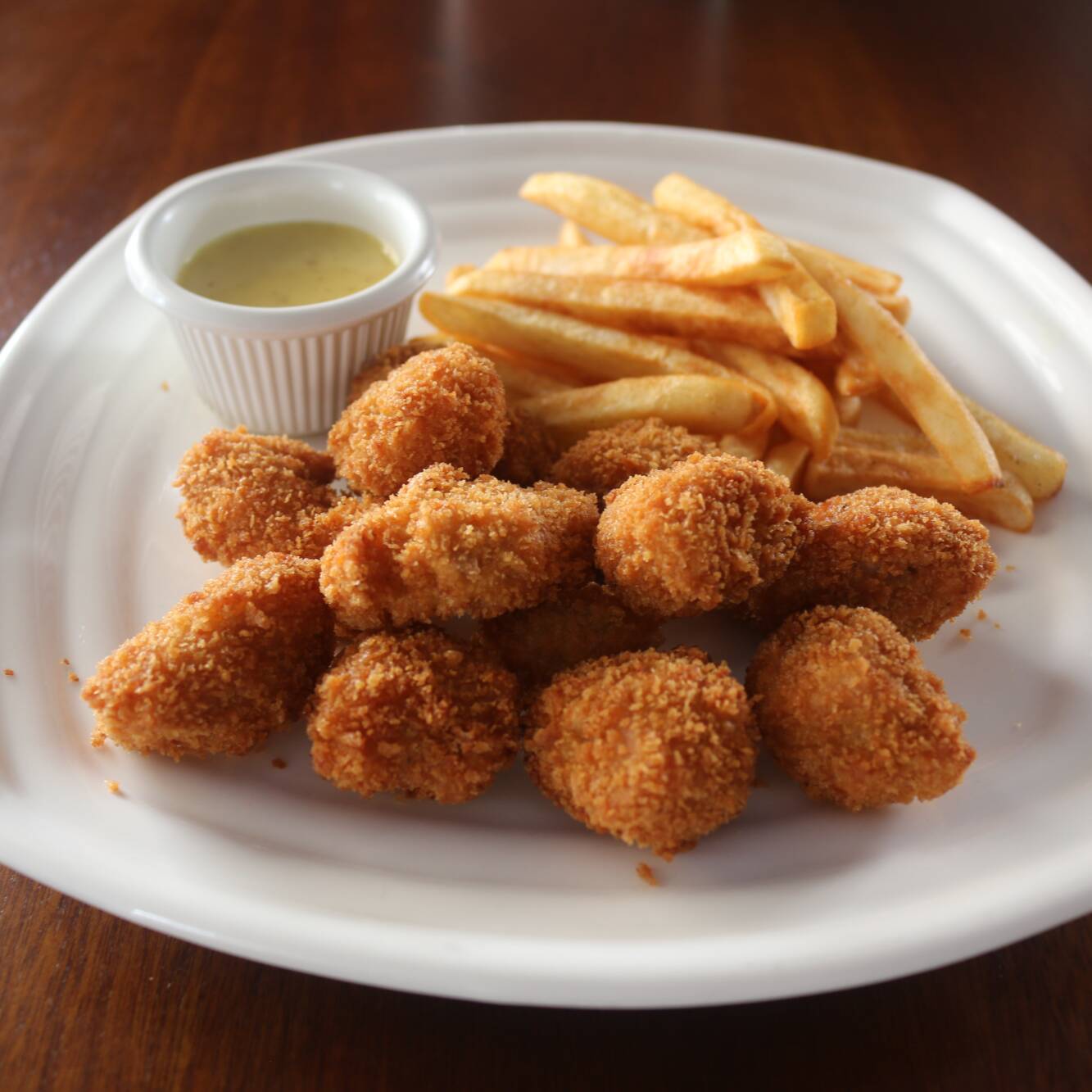 Dados de Pescado con Papas Fritas