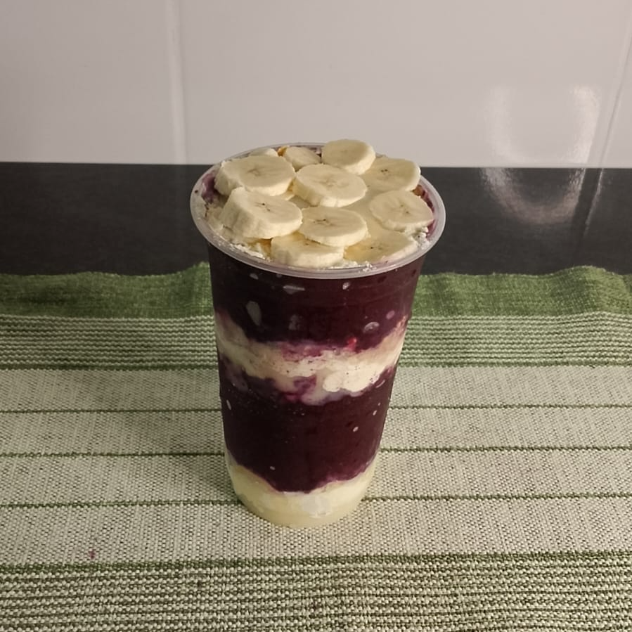 Açaí 💜
Tamanho ideal pra matar a vontade! Já vai COMPLETO com: leite em pó, leite condensado, granola crocante e banana.
👇 Quer turbinar? Adiciona Nutella, Morango ou Paçoca nos adicionais!