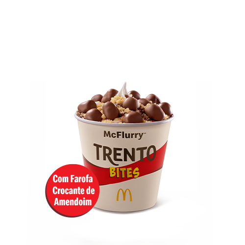 Sobremesa composta por bebida láctea sabor baunilha, cobertura sabor chocolate, morango ou caramelo, Trento Bites e ainda por cima com farofa crocante de amendoim