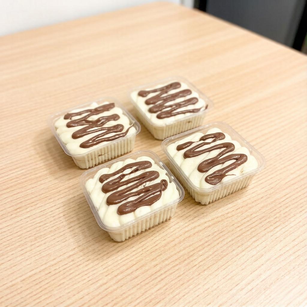 Uma explosão de sabor em cada colher! Camadas generosas de creme de leite Ninho, creme de brigadeiro caseiro e pedaços de bombom Ouro Branco picado ao meio, finalizado com mais creme dos dois sabores. Cremoso, crocante e simplesmente irresistível!