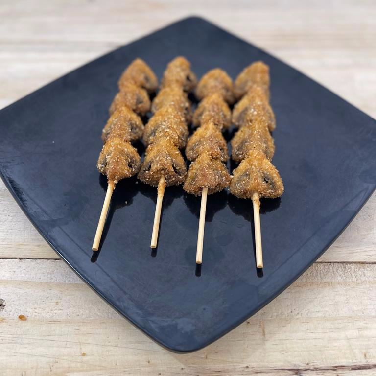 Pieza de brocheta de champiñon