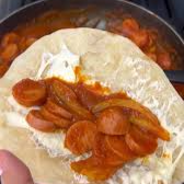 Taco de Salchichas en Salsa de Jitomate