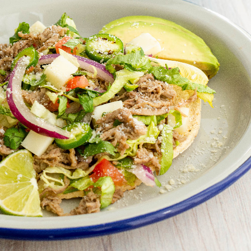 2 Tostadas de Carne y Un Agua del Dia