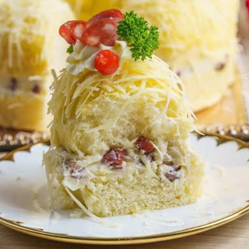 Nosso Pãozinho Delicia Tem Uma Massa Fofinha E Macia Com Recheiio de Creme De Parmesão Com Um toque de Calabresa Levemente Apimentada