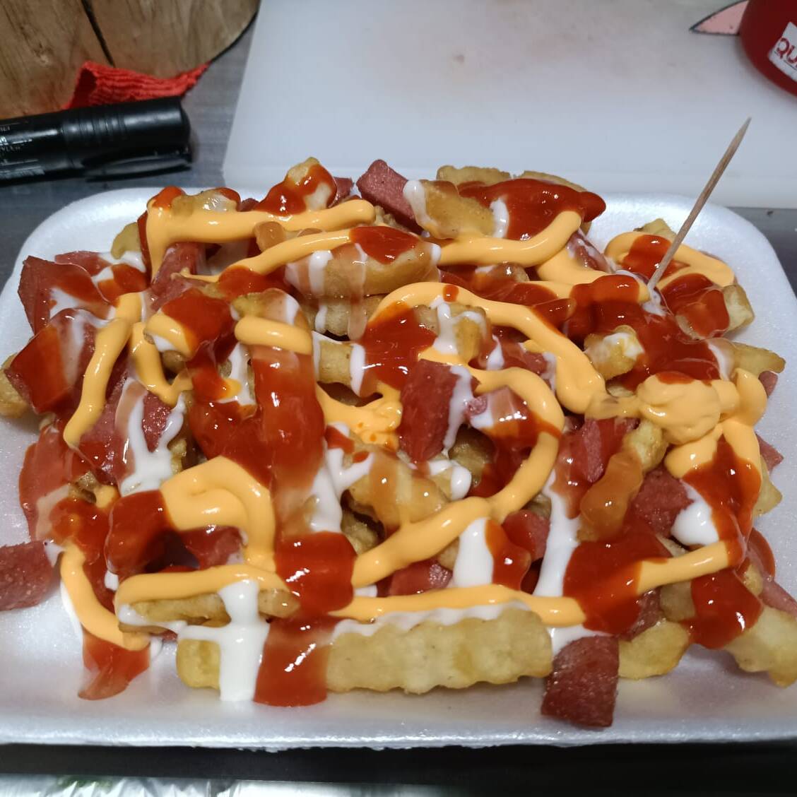 Papas Onduladas más Salchichas