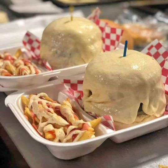 Hamburguesa bañada en queso x 2