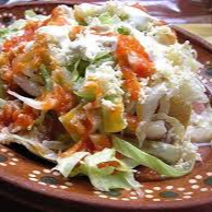 TOSTADAS CON CARNE DE CERDO