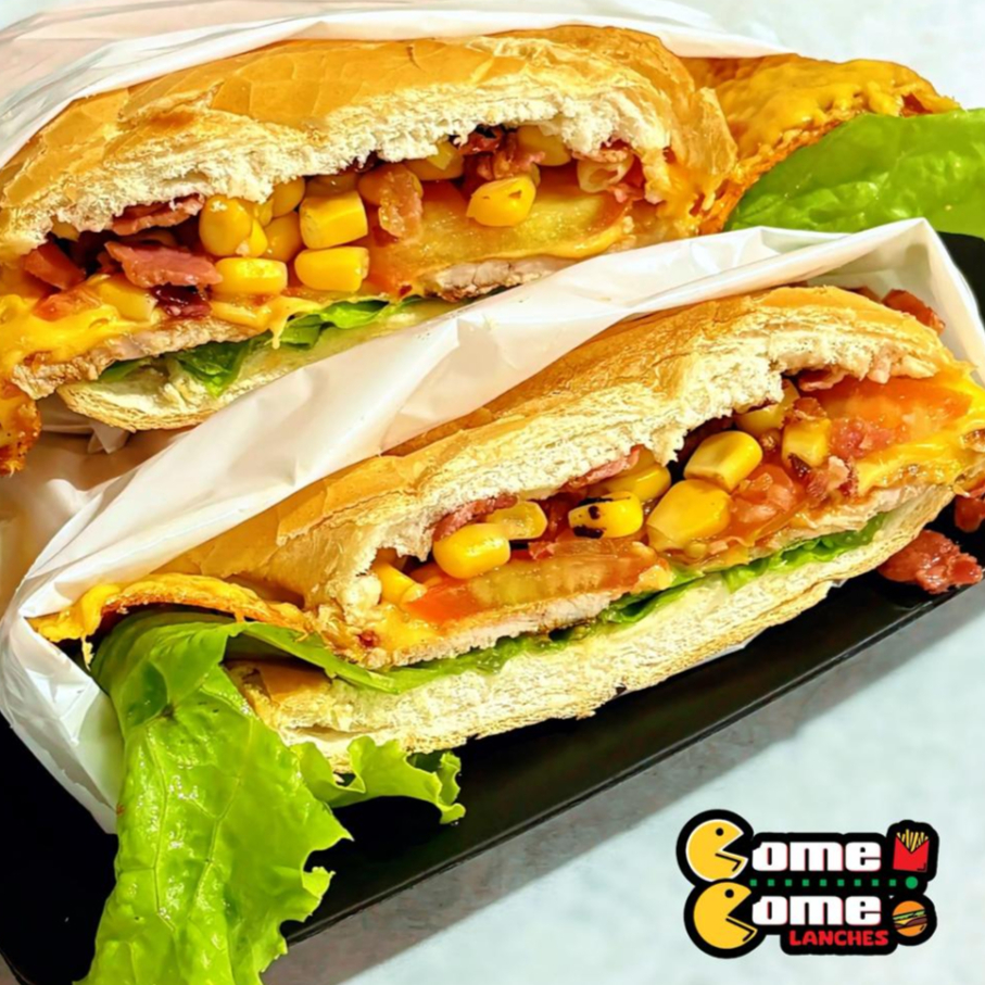 Pão francês, tomate, alface, milho, bacon, queijo e lombo