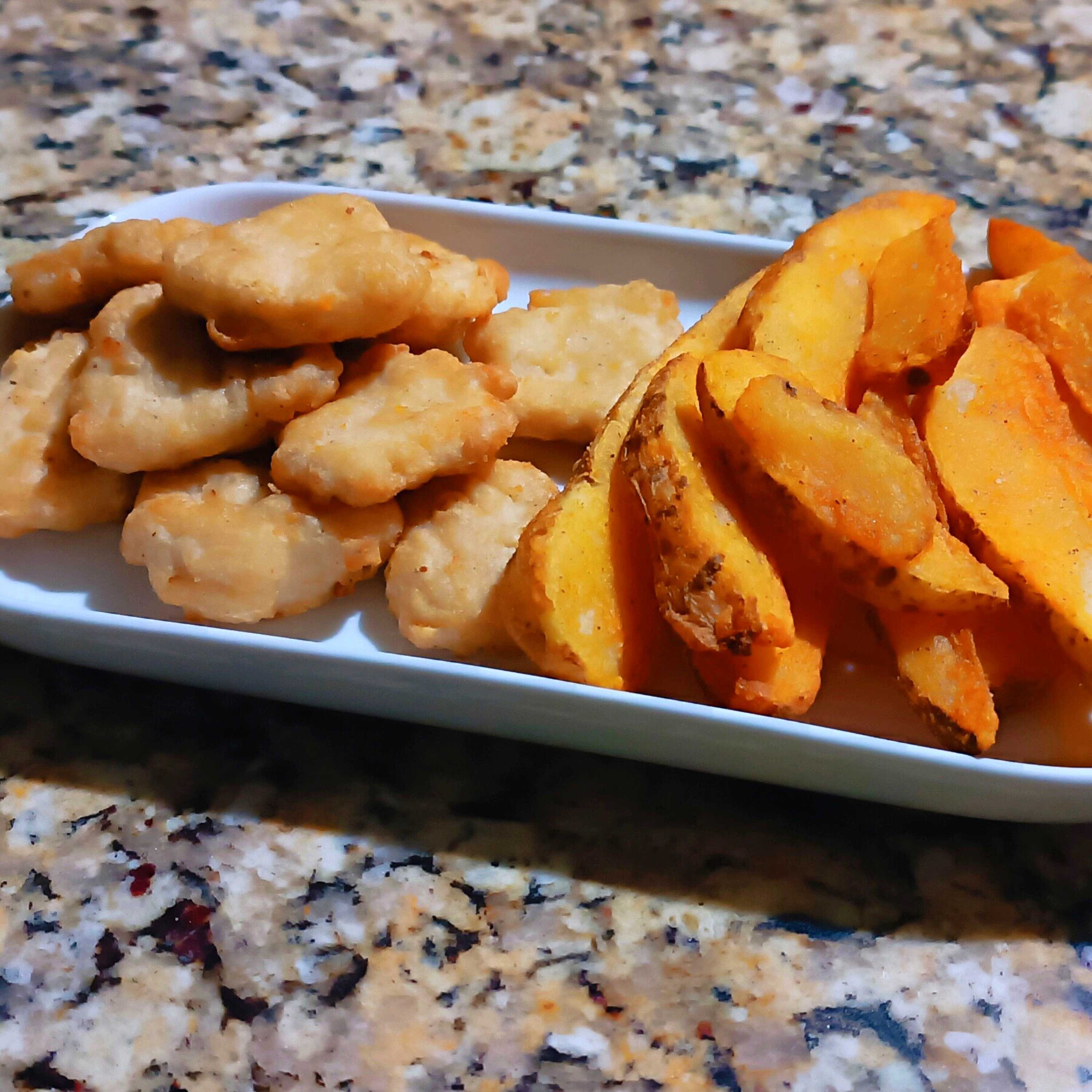 8 Nuggets + Papas En Gajo + Dip Ranch + Capsut