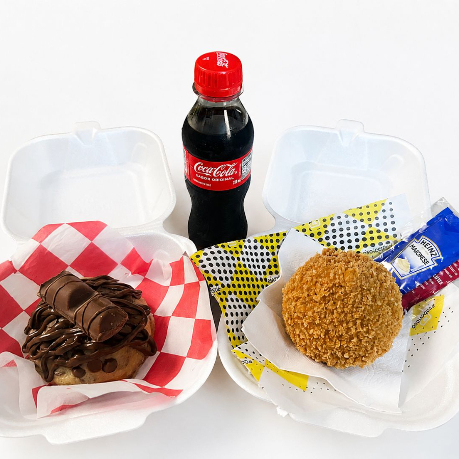Composto por uma coxinha, um cookie recheado e uma coca caçulinha.