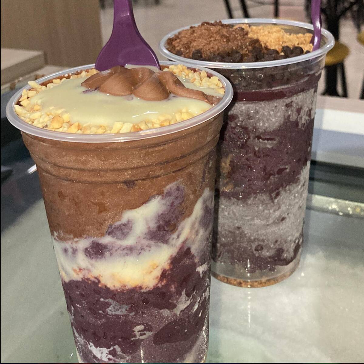 Açaí cremoso de verdade, montado em camadas e com até 4 adicionais do seu jeito. Capricho nos complementos, textura perfeita e aquele sabor que marca. Corre e prova um dos melhores açaís da sua vida.
