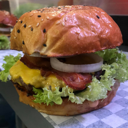Sonora Burger*1 + Media Orden de Aritos de Cebolla
