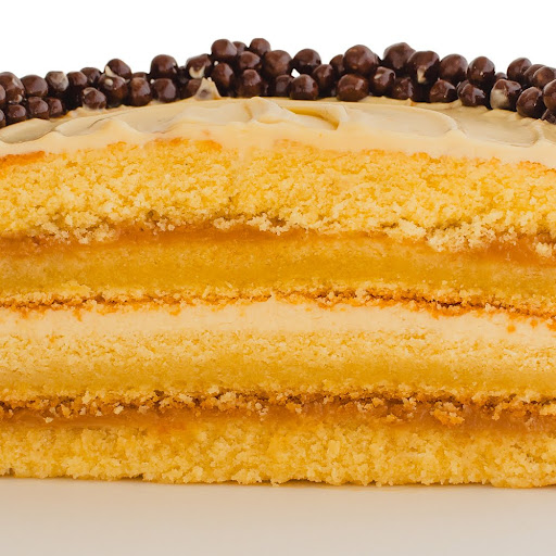 Porción Torta de Arequipe y Avellanas