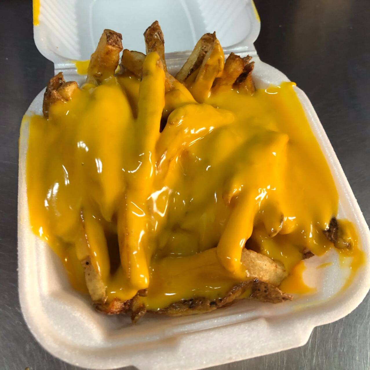 Papas con Queso Cheddar