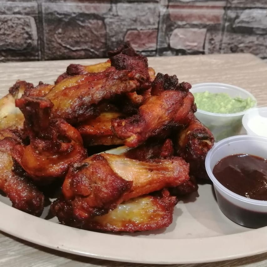 20 Alitas dip rach y guacamole habanero