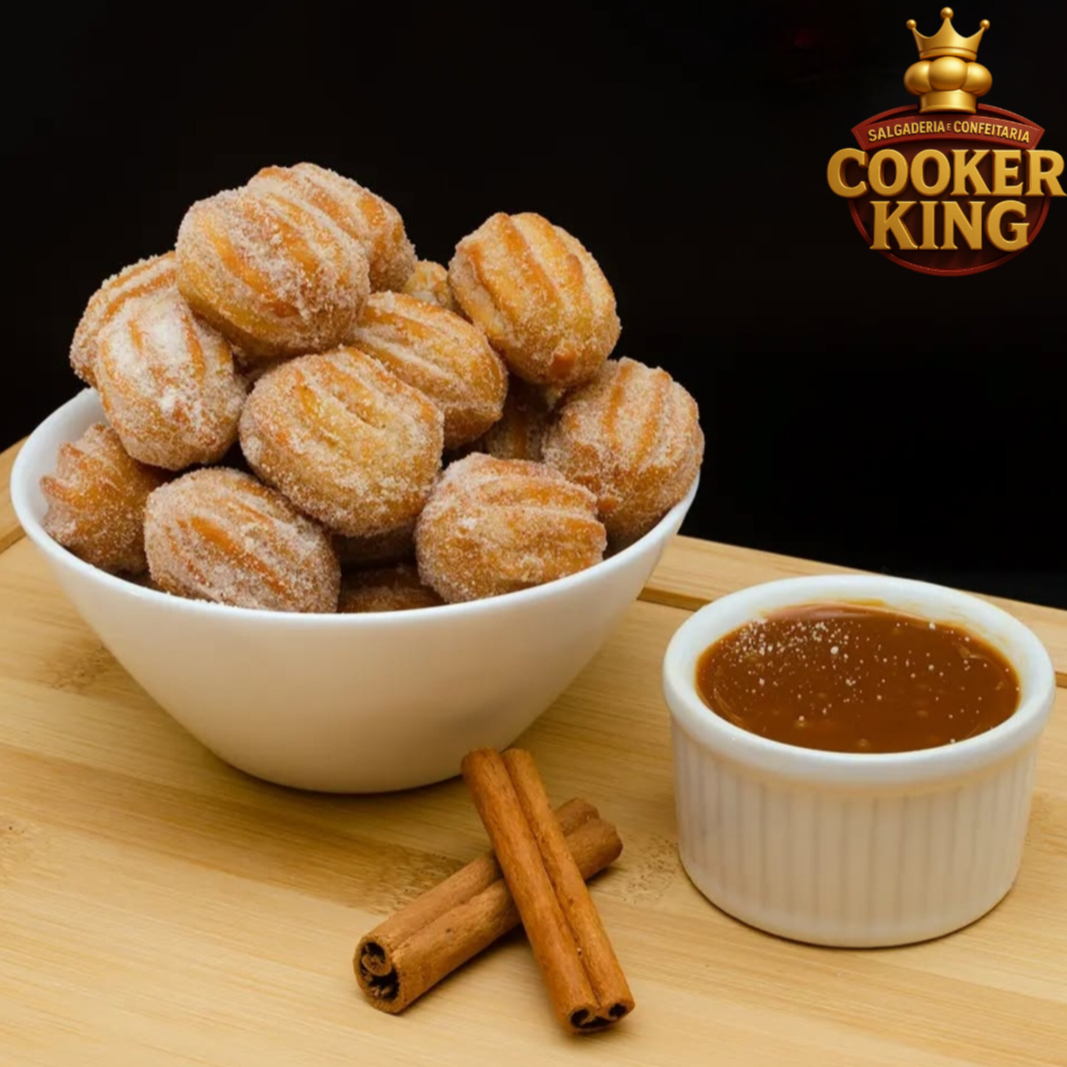 10 mini churros crocantes por fora e macios por dentro, recheados com delicioso doce de leite.