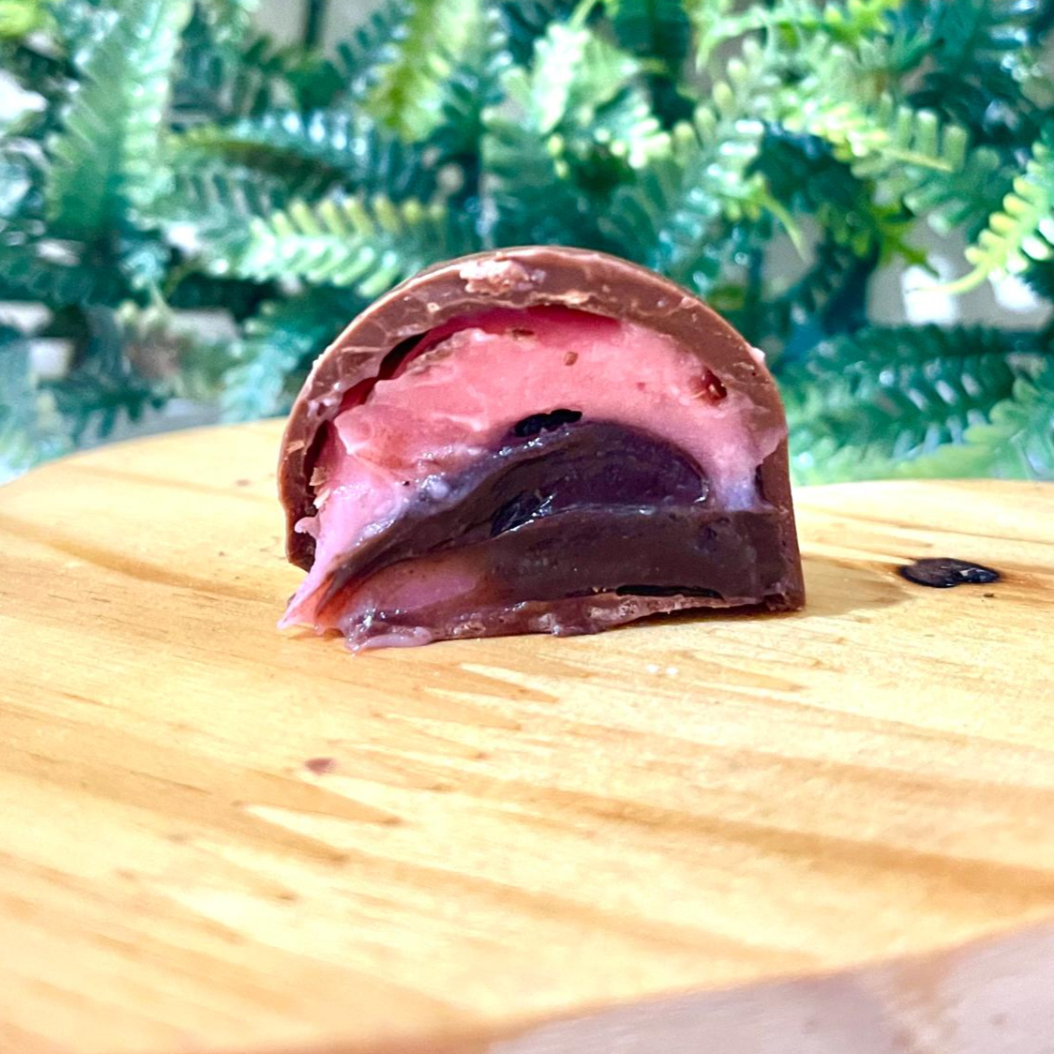 Trufa recheada de brigadeiro ao leite e bicho de pe