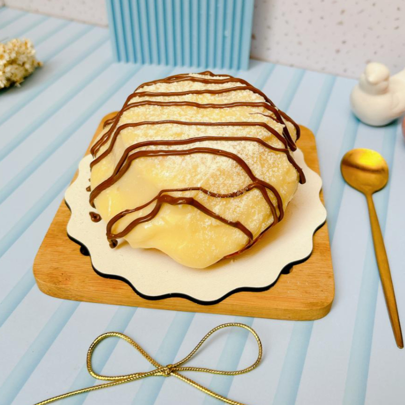 Massa caseira super fofinha com cobertura de brigadeiro de ninho e Nutella pura finalizado com leite Ninho e fios de Nutella