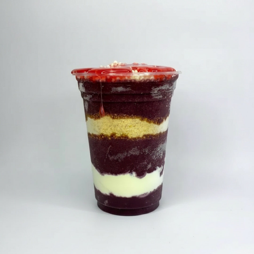 Açaí + leite Ninho + paçoca + flocos de arroz + cobertura a sua escolha.