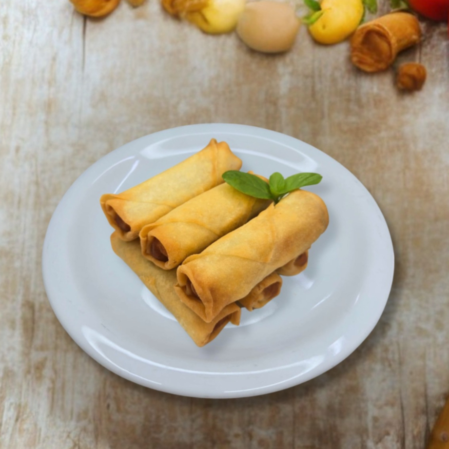 Feito com massa fina e crocante, recheado com legumes. Tamanho aproximado : 8x2 cm. Acompanha um sachê de molho agridoce