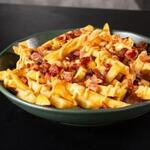 Uma Deliciosa Batata Recheada com bastante cheddar e Bacon.