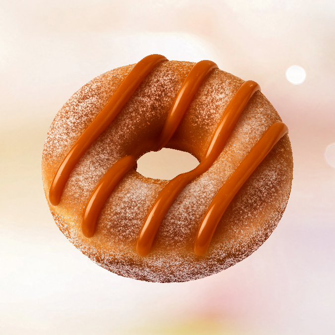 Um Bib's Donuts com gostinho de quero mais. massa leve e macia, envolta por uma camada de açúcar com canela e coberta com tiras de doce de leite.