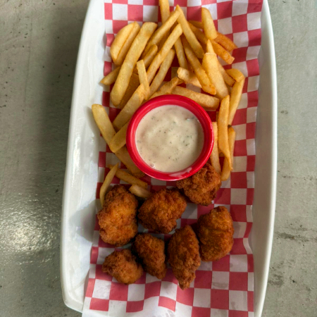 Nuggets de pollo con papas a la francesa