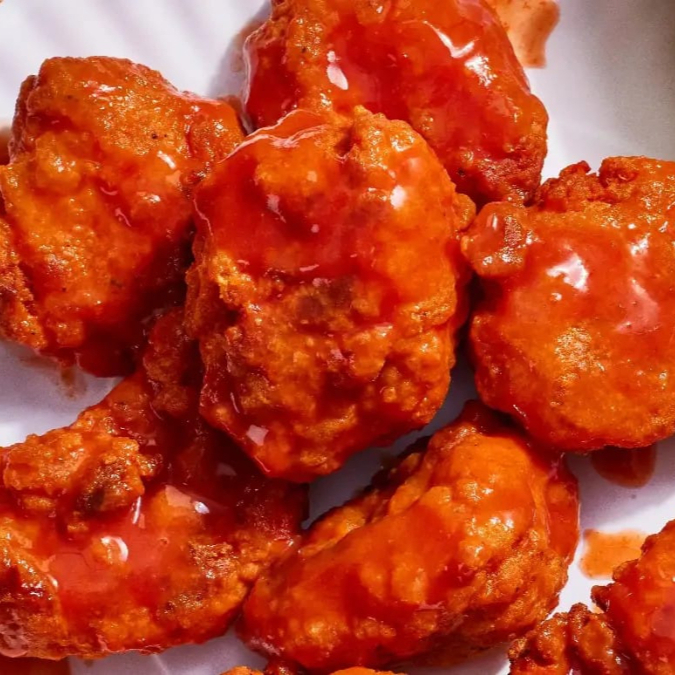 Boneless búfalo 8 piezas + porción de francesa