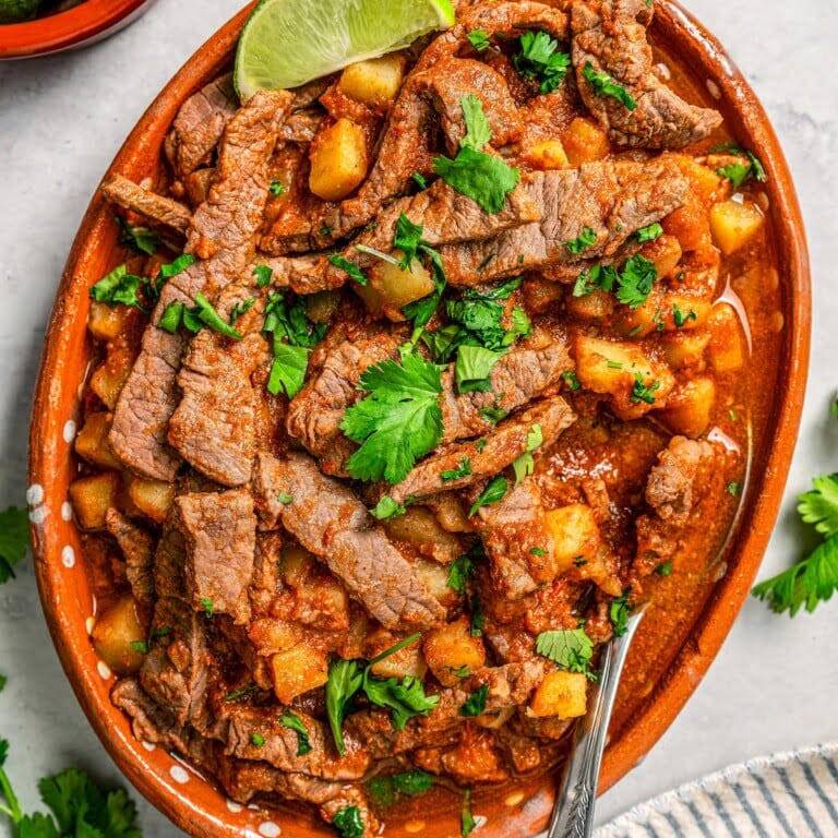 Bisteces De Puerco A La Mexicana.