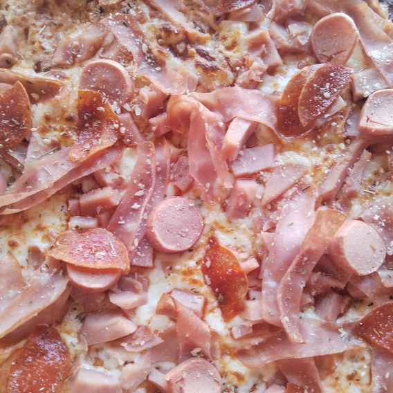 Pizza Carnes Frías. Gde. 35 cm. 8 reb.