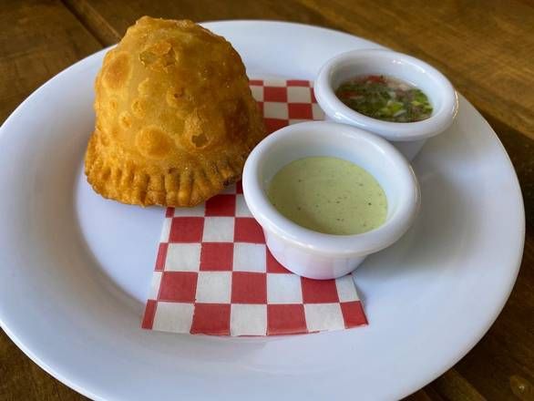 Pastel andino de carne con arroz