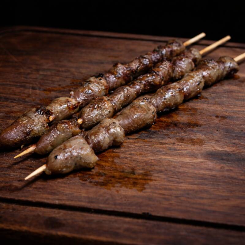 Coração de frango temperado e grelhado.