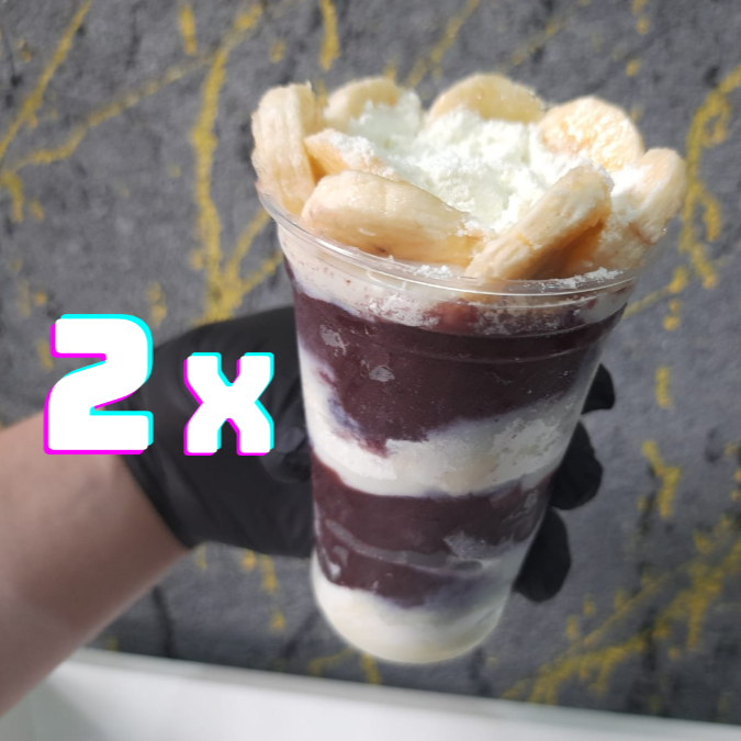 Monte e aproveite 2 Açaís de 440ml! Uma opção generosa, feita com açaí cremoso e saboroso, perfeita para dividir ou se deliciar sem moderação. Você escolhe 2 adicionais gratuitos para deixar a experiência ainda melhor. E se quiser, pode incrementar com extras irresistíveis, como Leite em Pó Ninho, Leite Condensado Moça, Paçoquita, Ovomaltine, Granola, Amendoim Granulado e muito mais! (Não entregamos complementos/adicionais separados.)