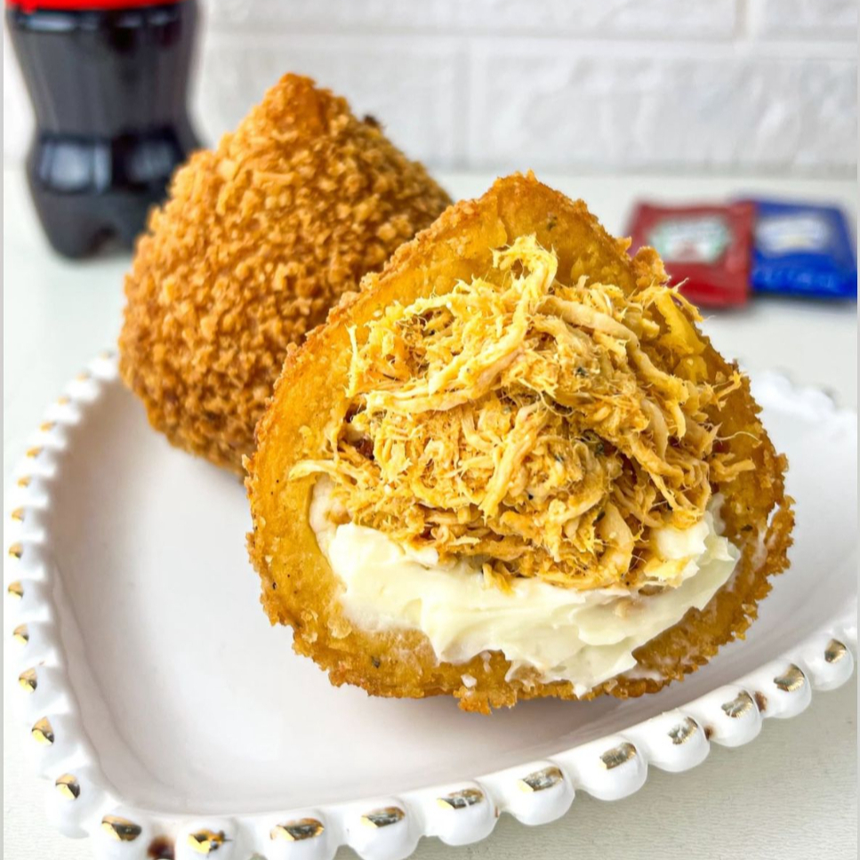 Descrição: Deliciosa coxinha de frango cremoso com catupiry original