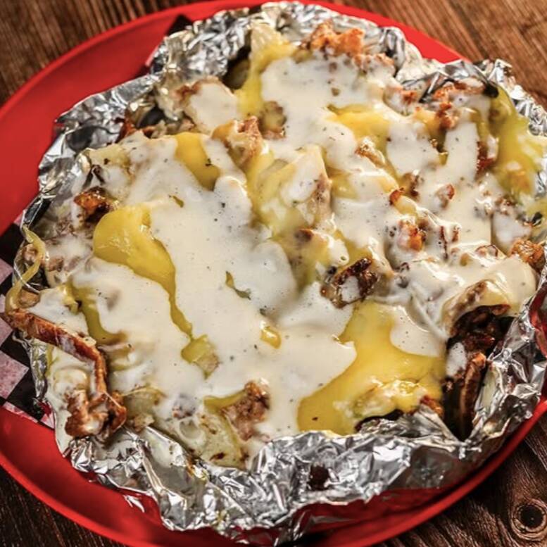 papa rellena de Tripa