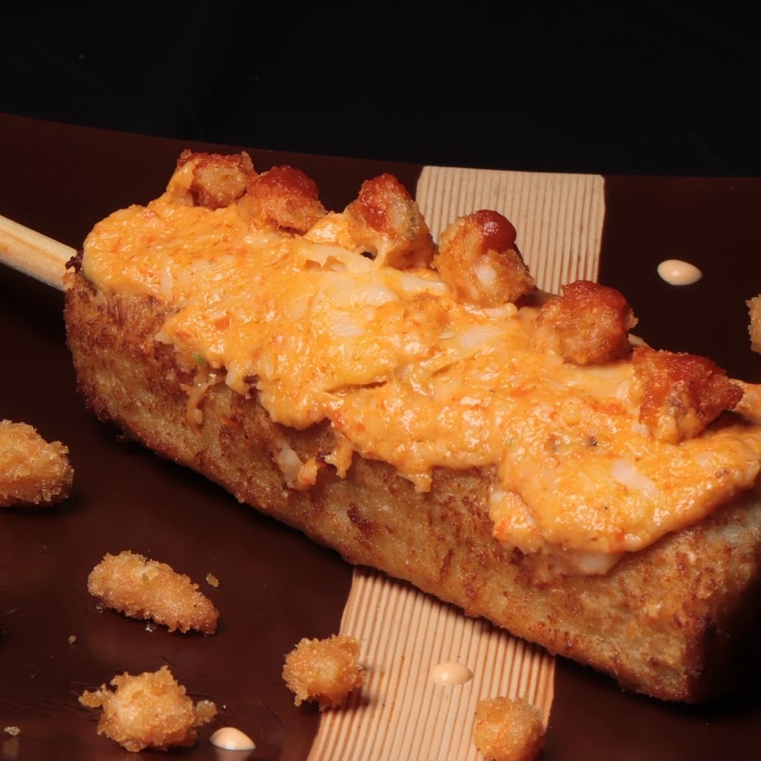 Banderilla de Res con Topping de Tres Quesos