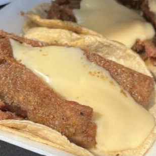 Taco de Milanesa con Queso