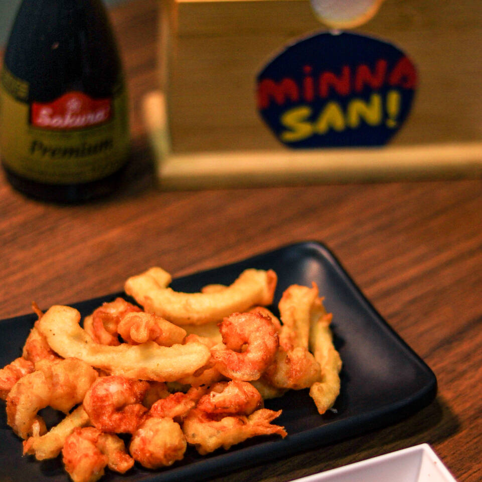 porção de 200 G de lula empanada