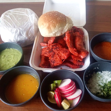 Un Cuarto De Longaniza