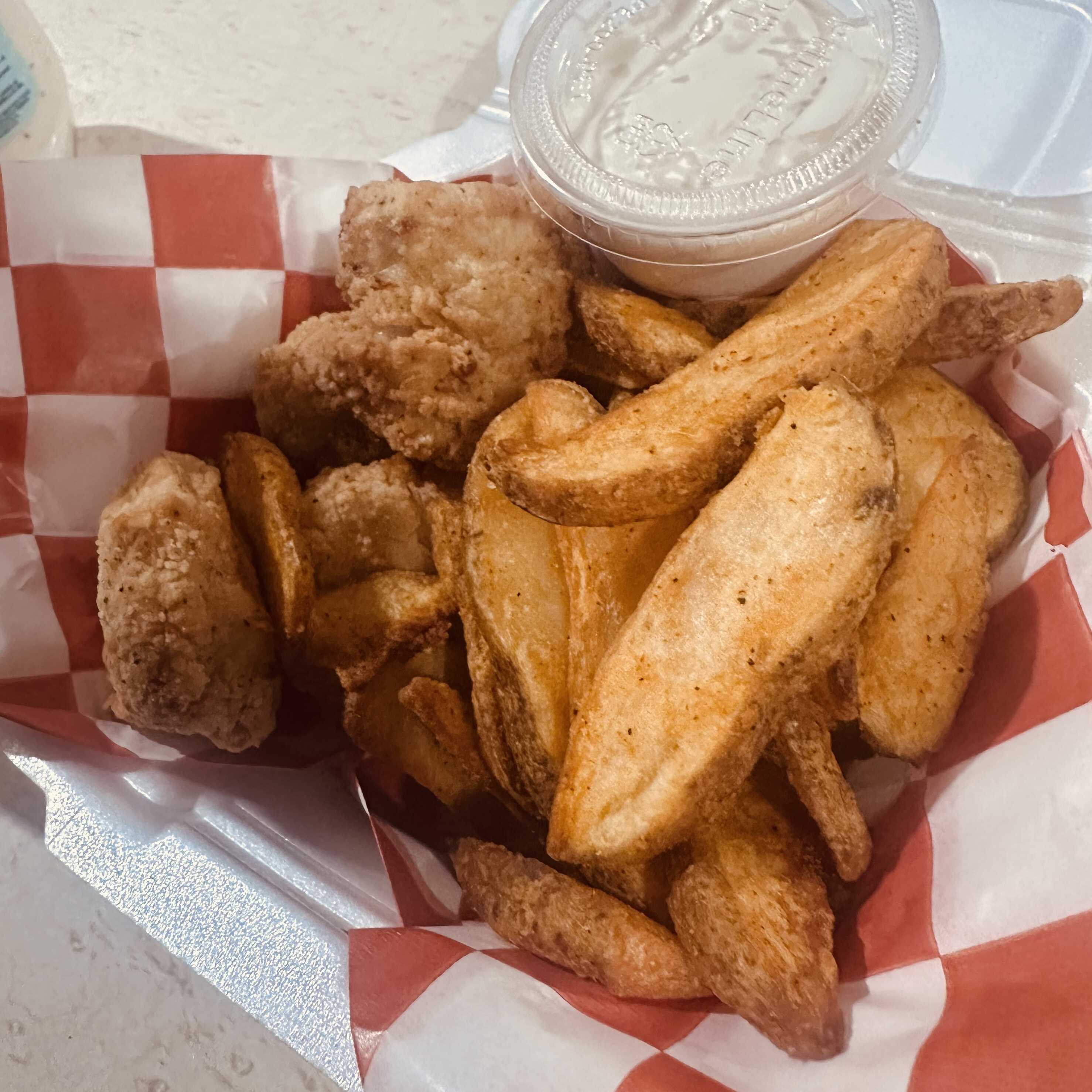Bites de Pollo + Papas en Gajo
