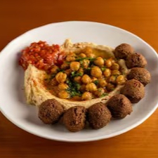 Berinjela grelhada, ovo cozido, molho amba aà base de manga, curry e especiarias), com o acompanhamento a sua escolha.