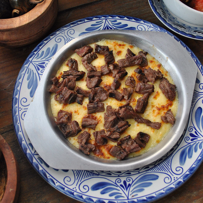 Queso Fundido con Chuleta