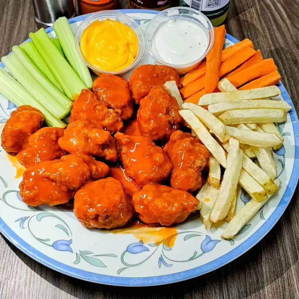 BONELESS EN SALSA BUFALO