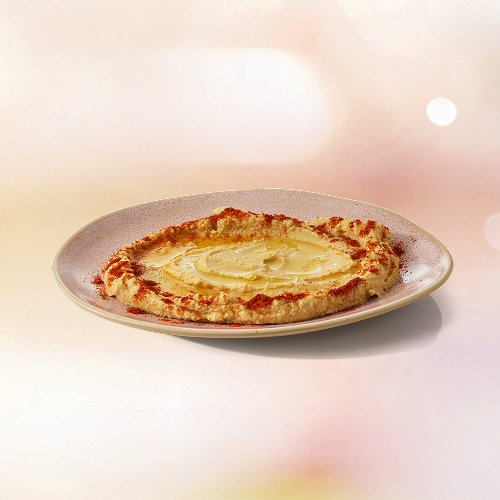 Esse é o original! direto das arábias para a sua mesa, o homus tem um sabor inconfundível e um tempero dos deuses. o segredo está no equilíbrio perfeito entre as ervas finas e a páprica defumada que tornam esse prato ainda mais delicioso. acompanha 1 minipão sírio e 1 minipão com zaatar. (120 g).